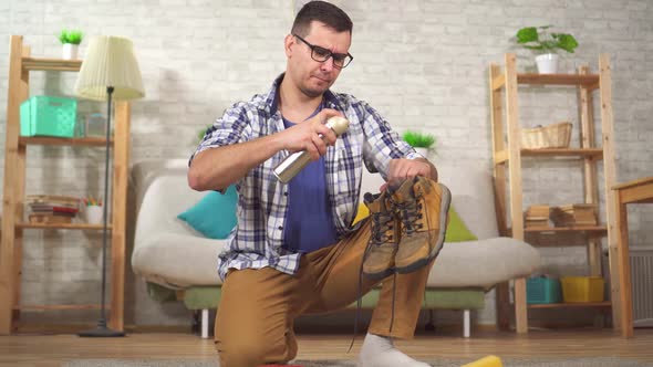 Man Cleans Shoes From Dirt Special Brush