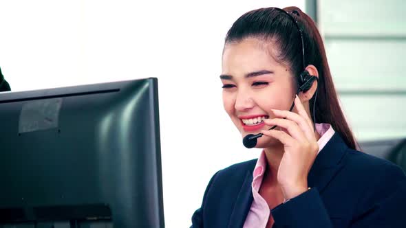 Business People Wearing Headset Working in Office