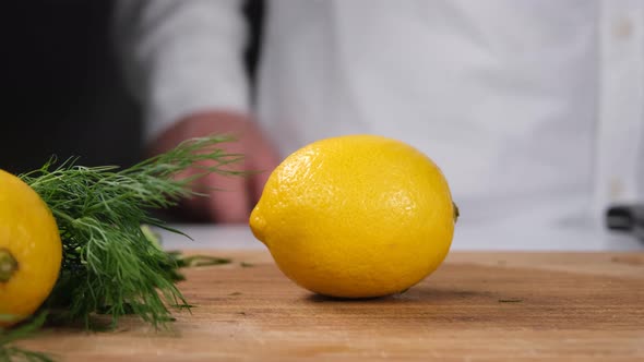 Chef Cutting Lemon