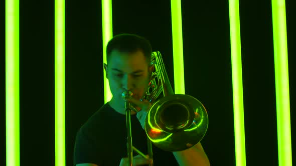 Solo Performance By a Musician Playing a Classical Brass Trombone