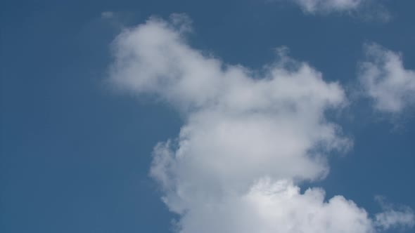 Fluffy White Clouds Moving Fast. Sunny Weather, Cloudy Heaven Background