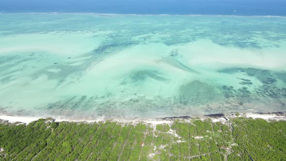 Zanzibar Tanzania  Aerial View of the Ocean Near the Shore of the Island Slow Motion