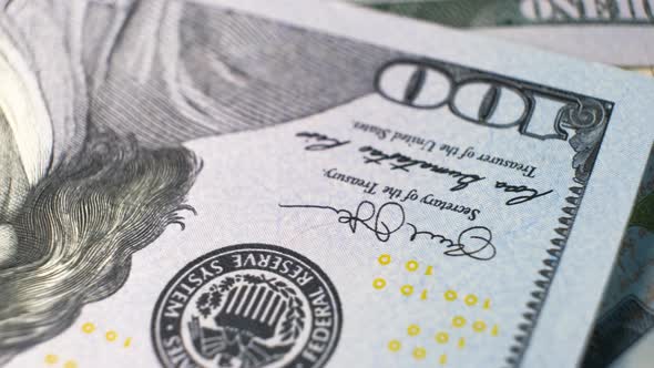 Close up detail of one hundred US dollars bills.