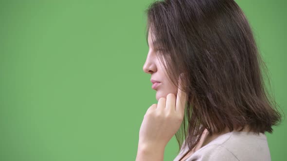 Profile View of Young Beautiful Woman Thinking