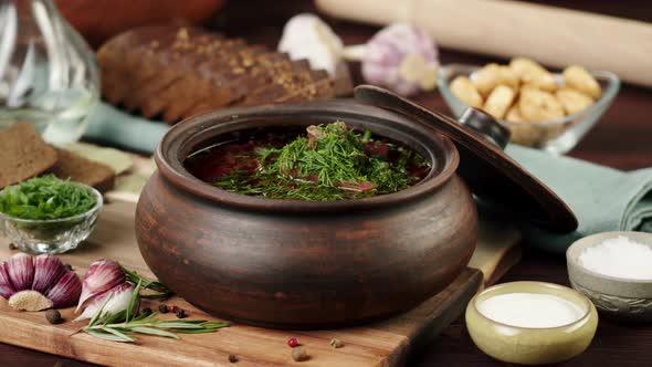 Hot Boiled Borsch with Greenery Dill on Board Closeup Cooking Soup Made of Beetroot