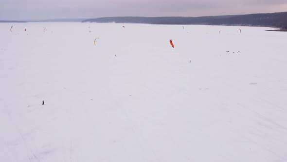 SnowKiting Kitesurfing Sport on the Ice Lake Winter