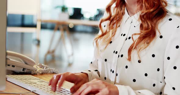 Businesswoman working on computer