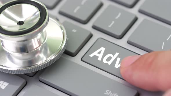 ADVICE Key Being Pressed on a Computer Keyboard