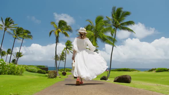 Slow Motion Female in White Flying on Breeze Dress on Tropical Island Dream Trip