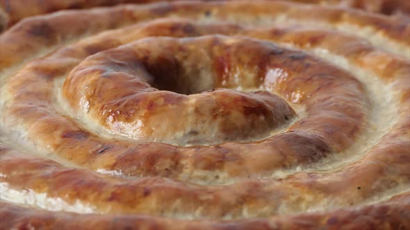 Hot Homemade Sausage Lies on the Cutting Board