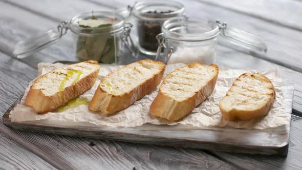 Liquid Pours on Bread Slices.