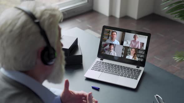 Close Up of Elderly Man Talk with Diverse Relatives on Video Call Using Laptop Quarantine at Home