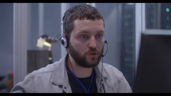 Young Man Working in Data Center