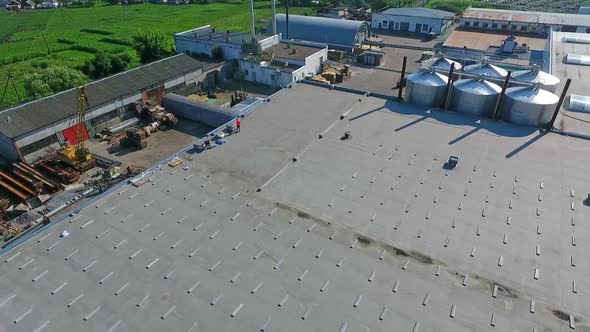 Building the solar farm on flat roof