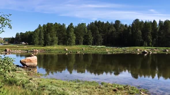 Specatacular view of nature - woods and lakes in Karelia, Russia. Camera motion from left to right.