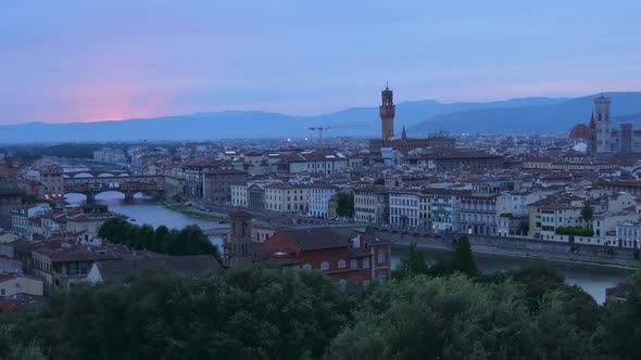 Beautiful pink sky over Florence city in Italy - sunset time lapse shot