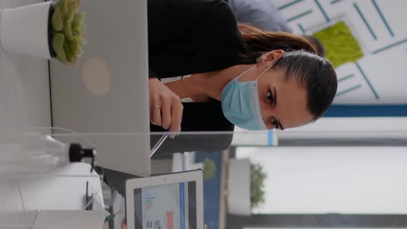 Vertical Video Close Up of Coworkers with Face Mask Working Together at Financial Project