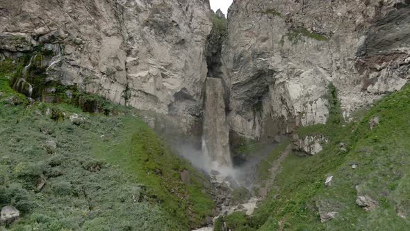 Dirty Waterfall Sultan High in the Mountains Near Elbrus in Summer