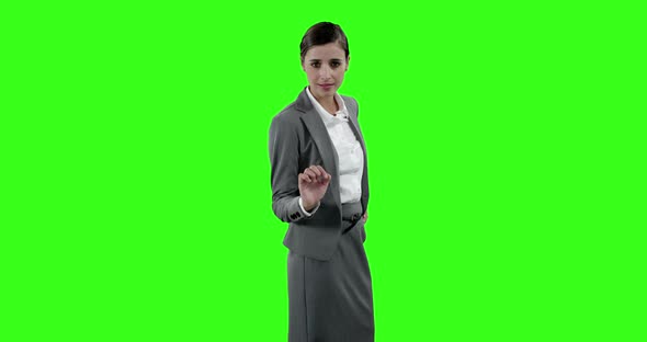 Businesswoman touching digital screen