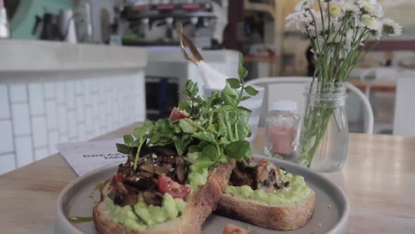 Vegan Plant Based Healthy Avocado Toast with Mushroom at Restaurant