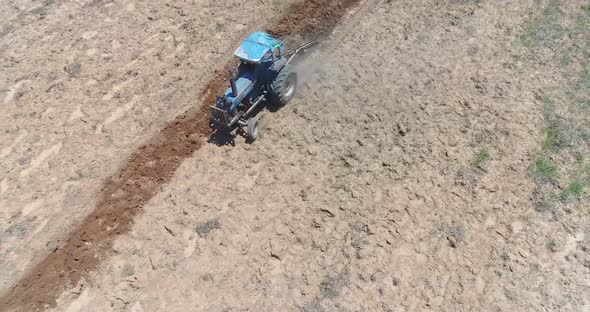 Tractor Plowing on a beatiful Landscape4K 50fpsShot on DJI PT4