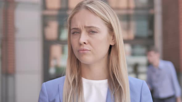 No, Young Businesswoman Shaking Head To Reject