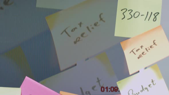 Many Color Reminder Sticky Notes on the Office Monitor