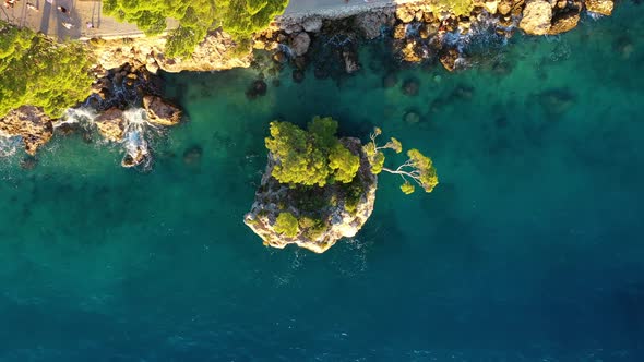 Croatia. Aerial view on rocks and forest. Vacation and adventure. Rocks and turquoise water. 