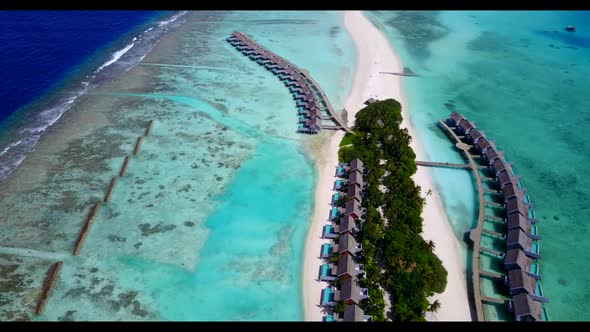 Aerial top down tourism of luxury tourist beach voyage by blue sea with white sand background of adv