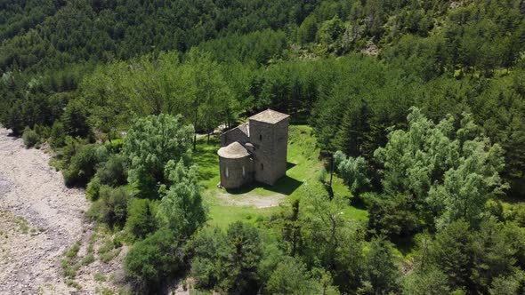 Circular drone view of a mountain church