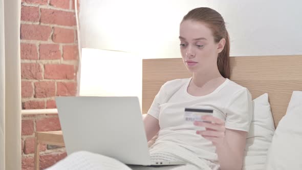 Redhead Young Woman Reacting To Online Payment Failure on Laptop 