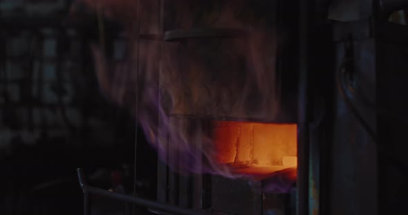 Gas Furnace in Forge Workshop Closeup View Flame From Oven Metal Billets are Heating  Prores