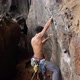 Climber On Wall Of Rough Mountain - VideoHive Item for Sale