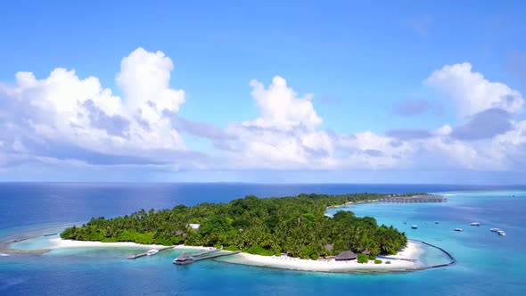 Drone aerial panorama of marine tourist beach journey by sea with sand background