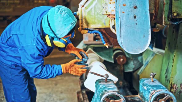 Industrial Worker at Factory on Granite Manufacture