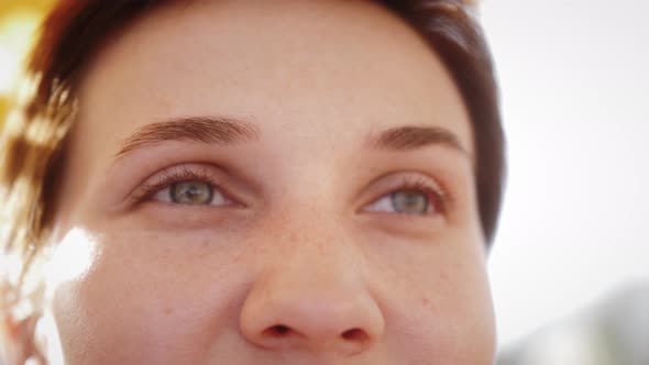 Close Up of Woman’s Face Natural Beauty with Freckles