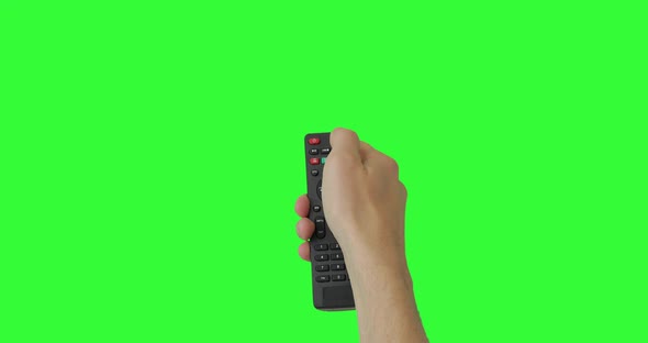 Isolated Male hand with TV remote pressing button turn on or off TV. Green screen. Pack of Gestures.