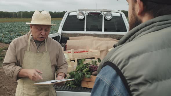 Farmer Talking About Agreement