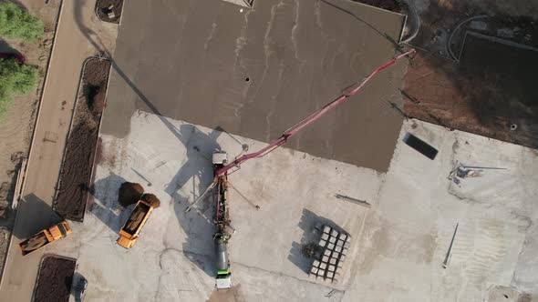 Aerial View  Road Construction Site and a Big Pump for Concrete Pouring Road