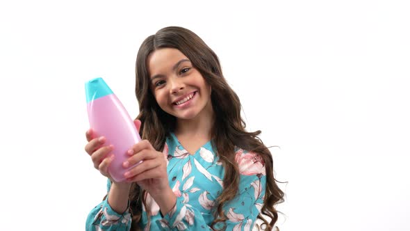 Happy Teen Girl Turning Showing Her Long Curly Hair Presenting Shampoo Show Thumb Up Daily Habits