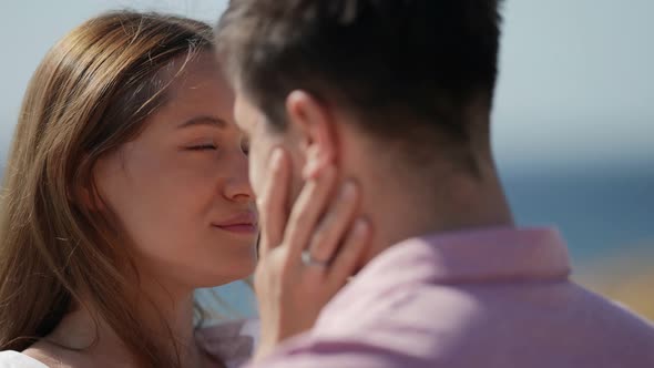 Tender Kiss of Lovers Outdoor in Summer Young Woman is Kissing Tenderly Her Boyfriend