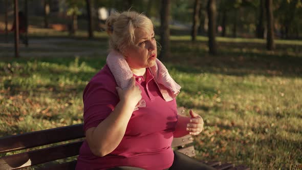 Fat Woman Resting After Running