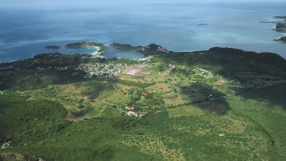 City of St John's, forest, bay and liner in azure sea from a bird's eye view in Antigua and Barbuda