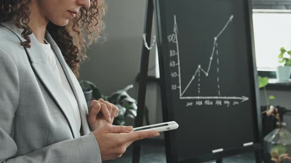 Businesswoman with Digital Tablet in Modern Office