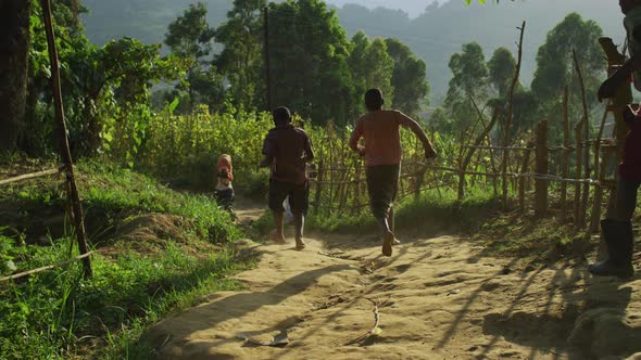 Children running on a path