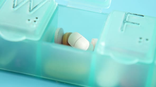 Close Up of Medical Pills in a Pill Box
