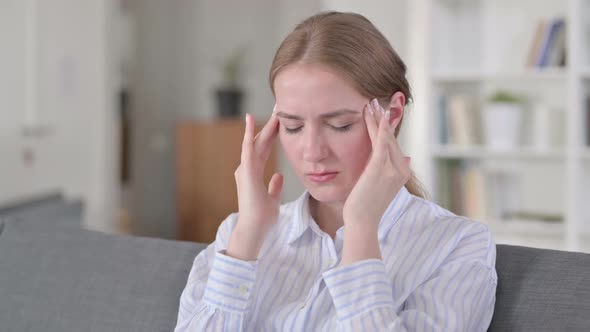 Portrait of Exhausted Young Woman Having Headache