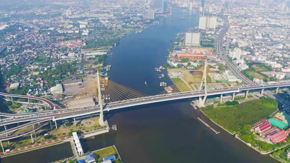Aerial view of Bhumibol Bridge and Chao Phraya River in structure of suspension architecture