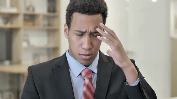 Headache Stressed African Businessman