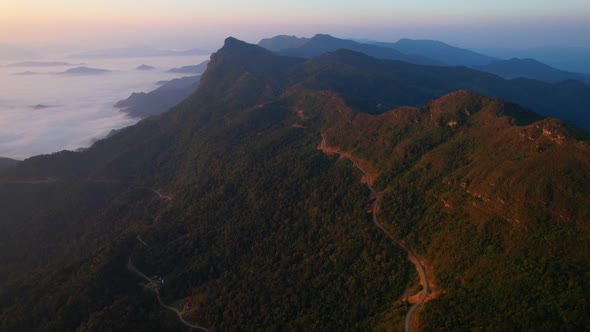 4K Aerial view of Mountains landscape with morning fog.